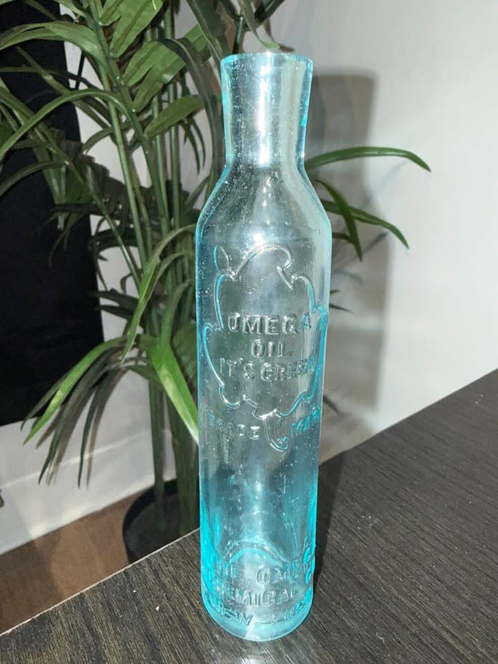 Antique Omega Oil It's Green Embossed Aqua Glass Bottle Omega Chemical Co NY